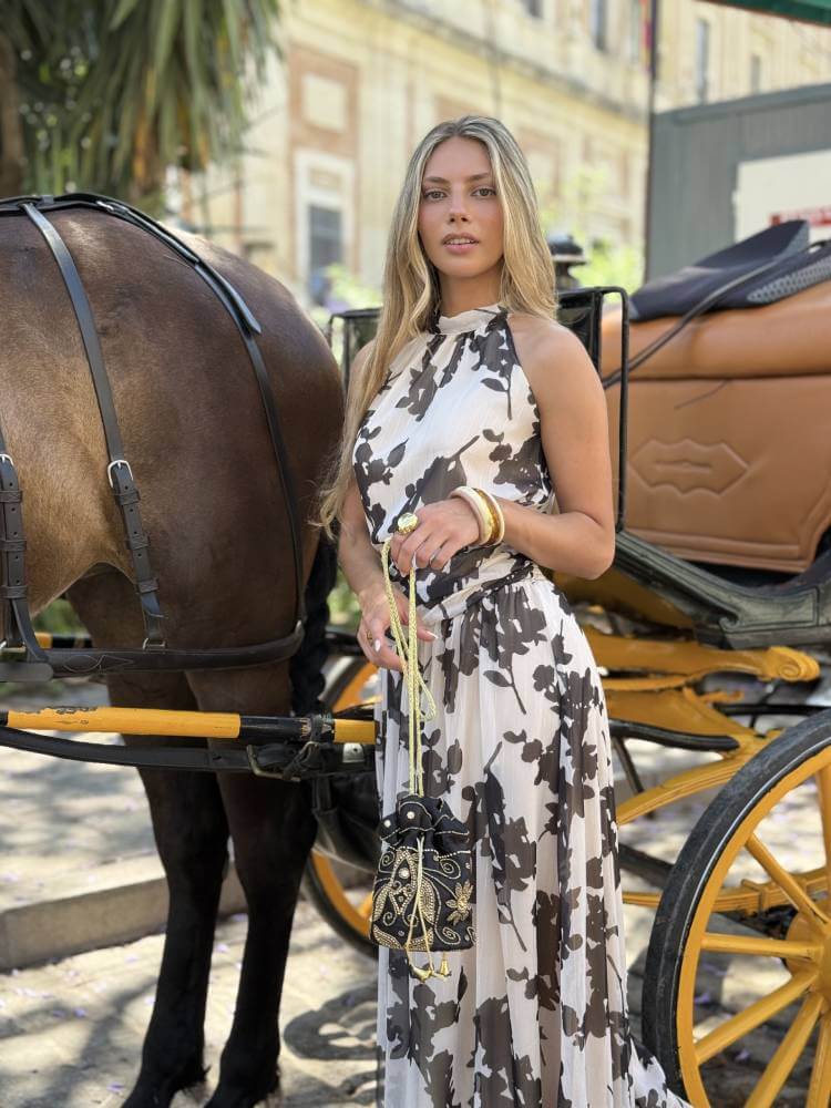 Conjunto de top y falda en tejido de gasa color blanco y negro para invitada